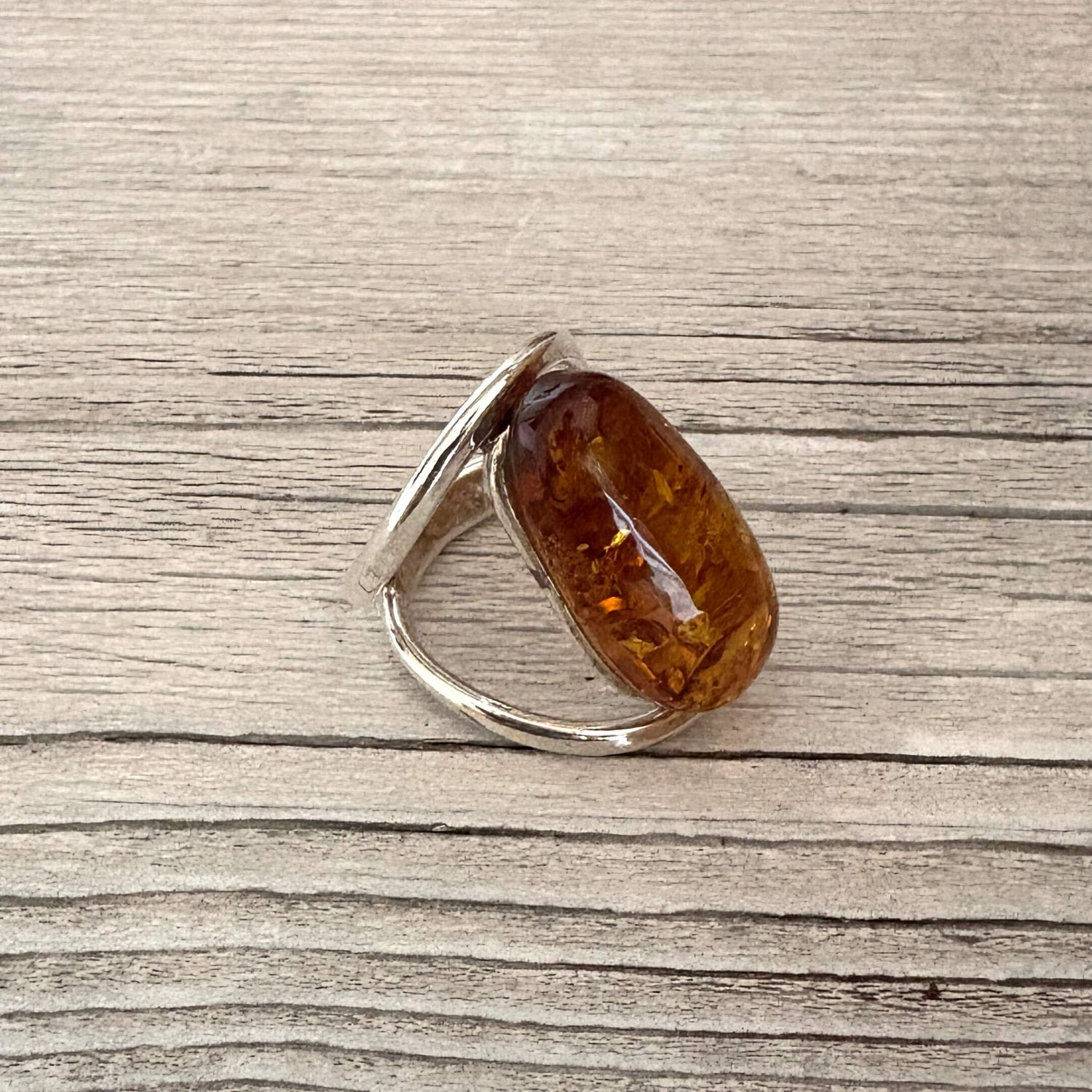 statement oval shaped adjustable amber ring