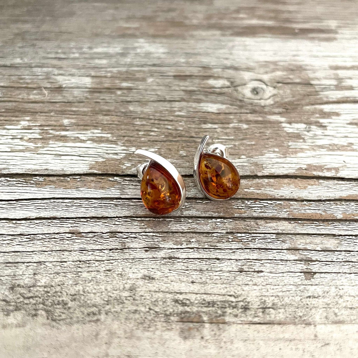 cognac amber tear drop earrings set in sterling silver
