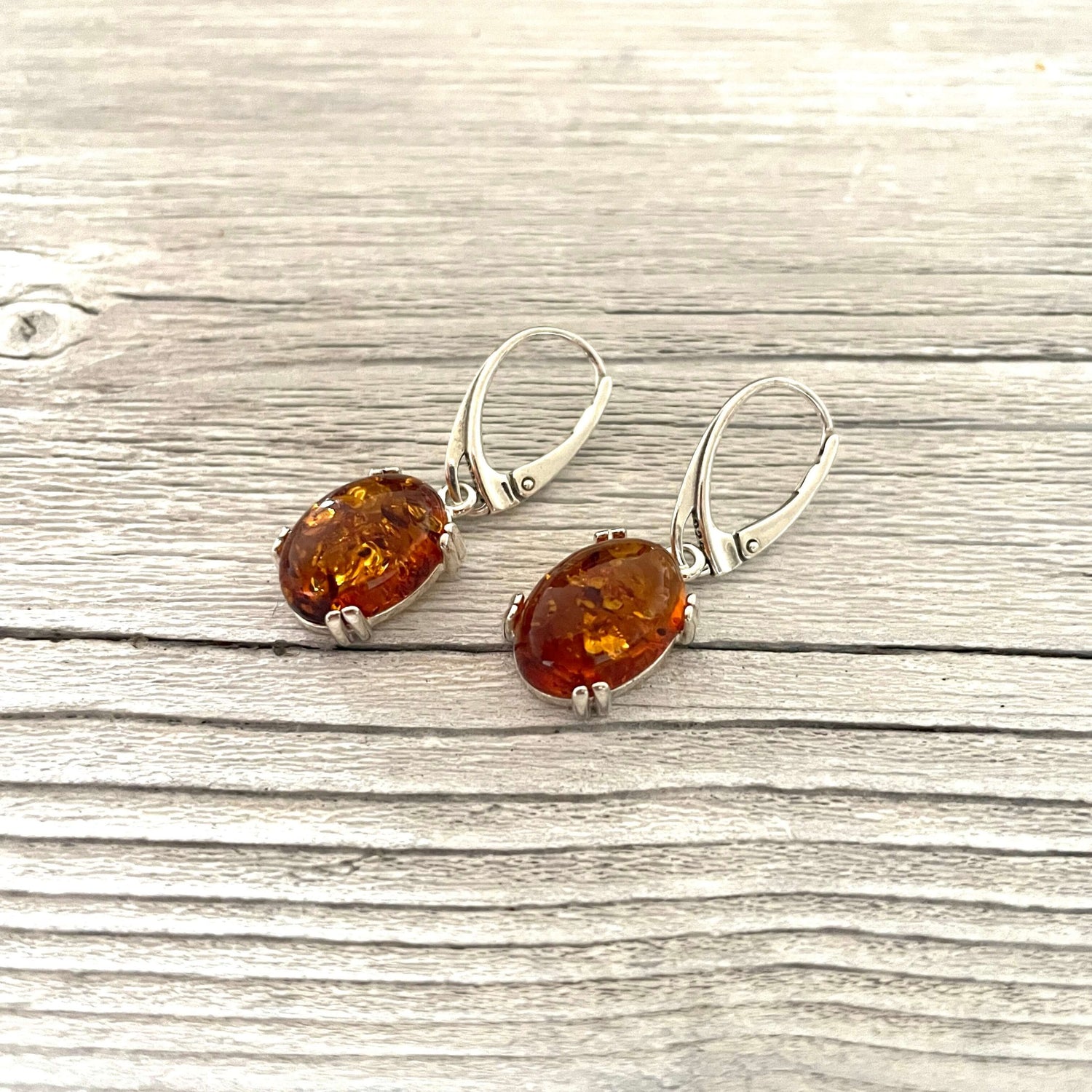 lever back oval shaped cognac amber earrings