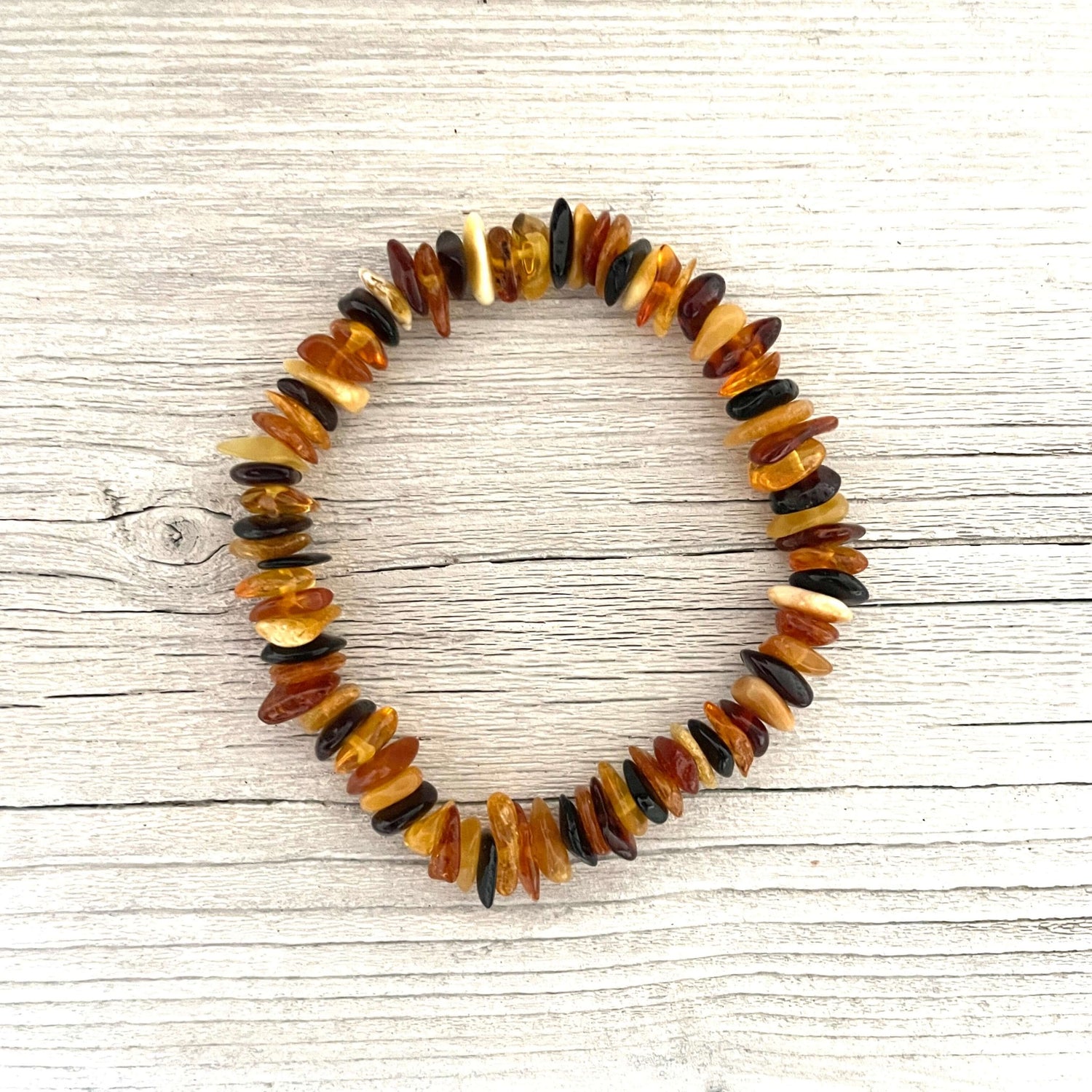 mixed coloured beaded amber bracelet on elastic