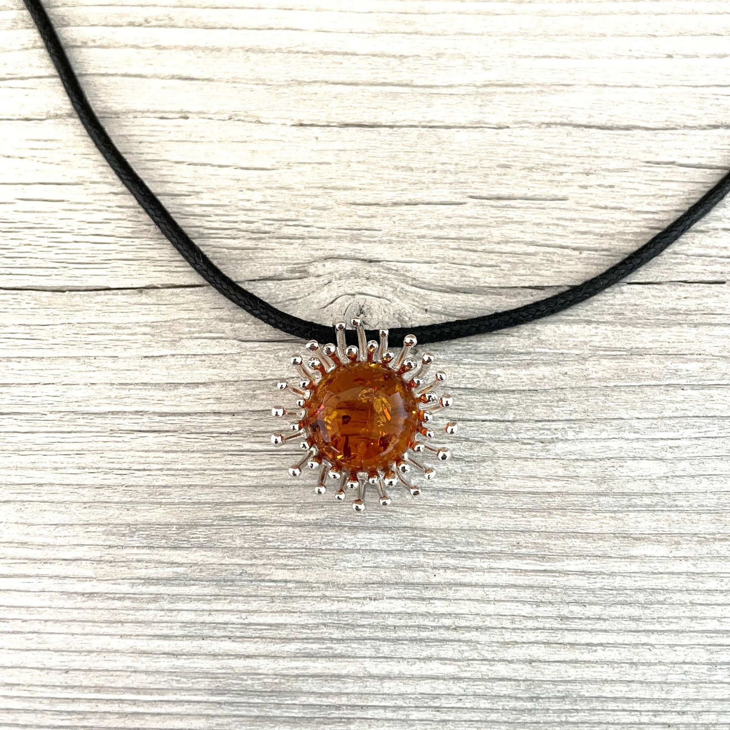 polished amber silver pendant