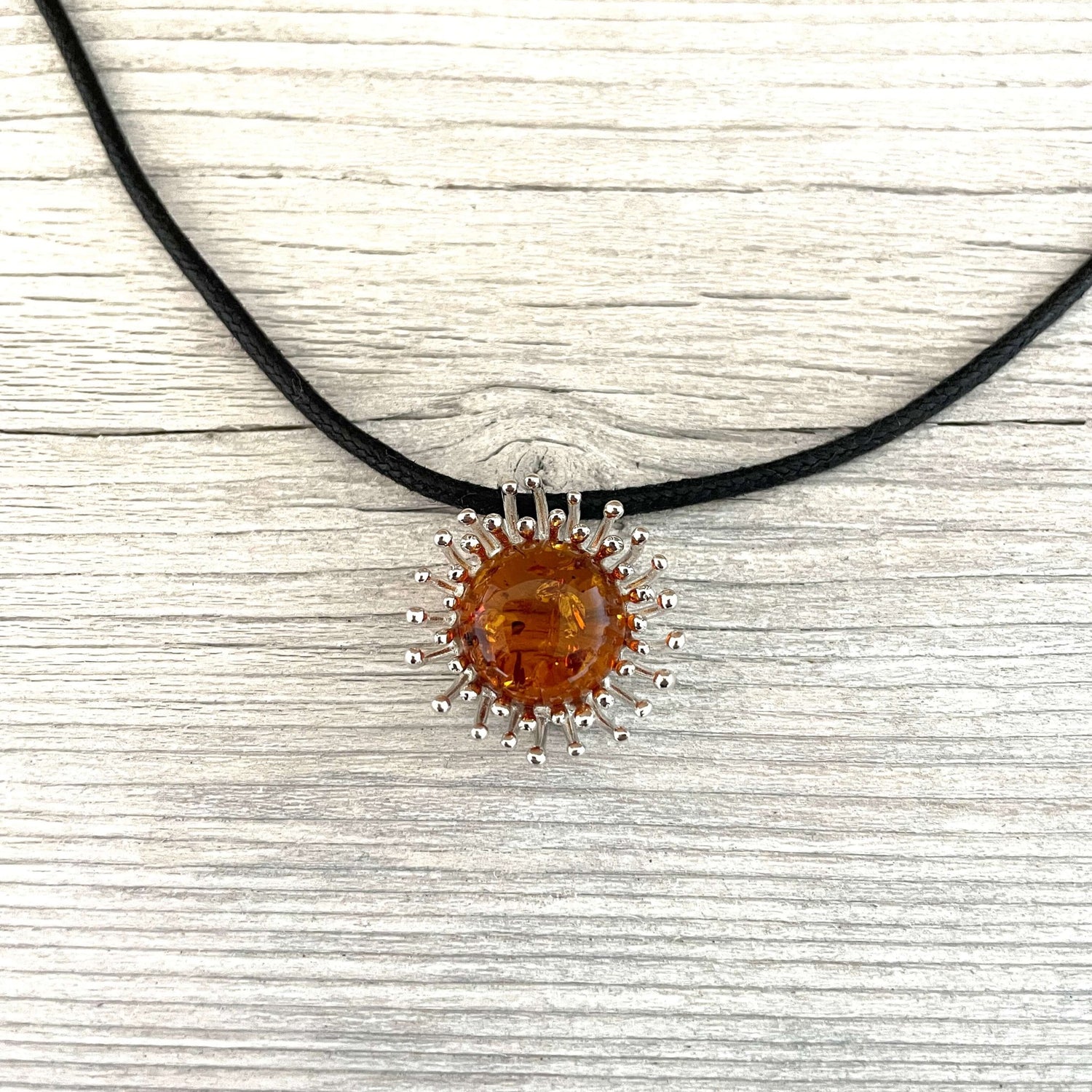 polished amber silver pendant