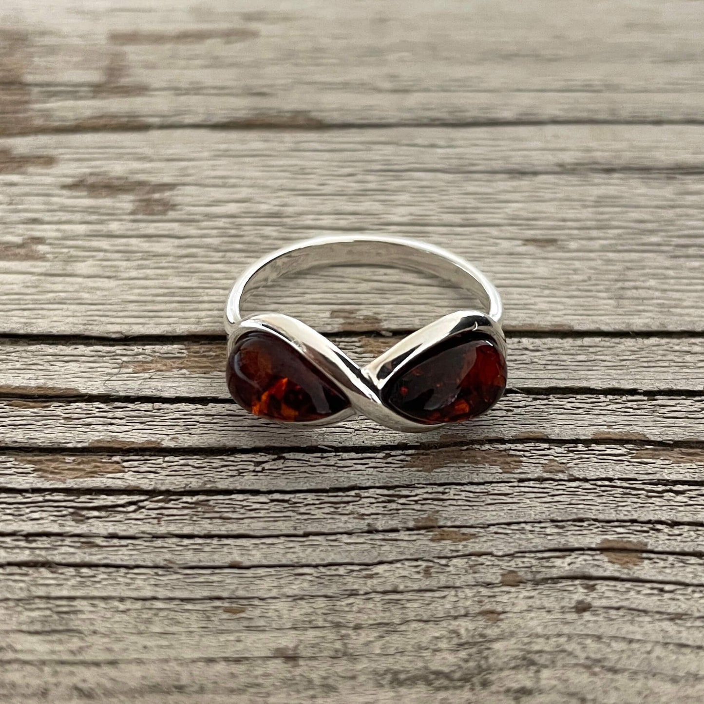 infinity shaped cognac amber ring