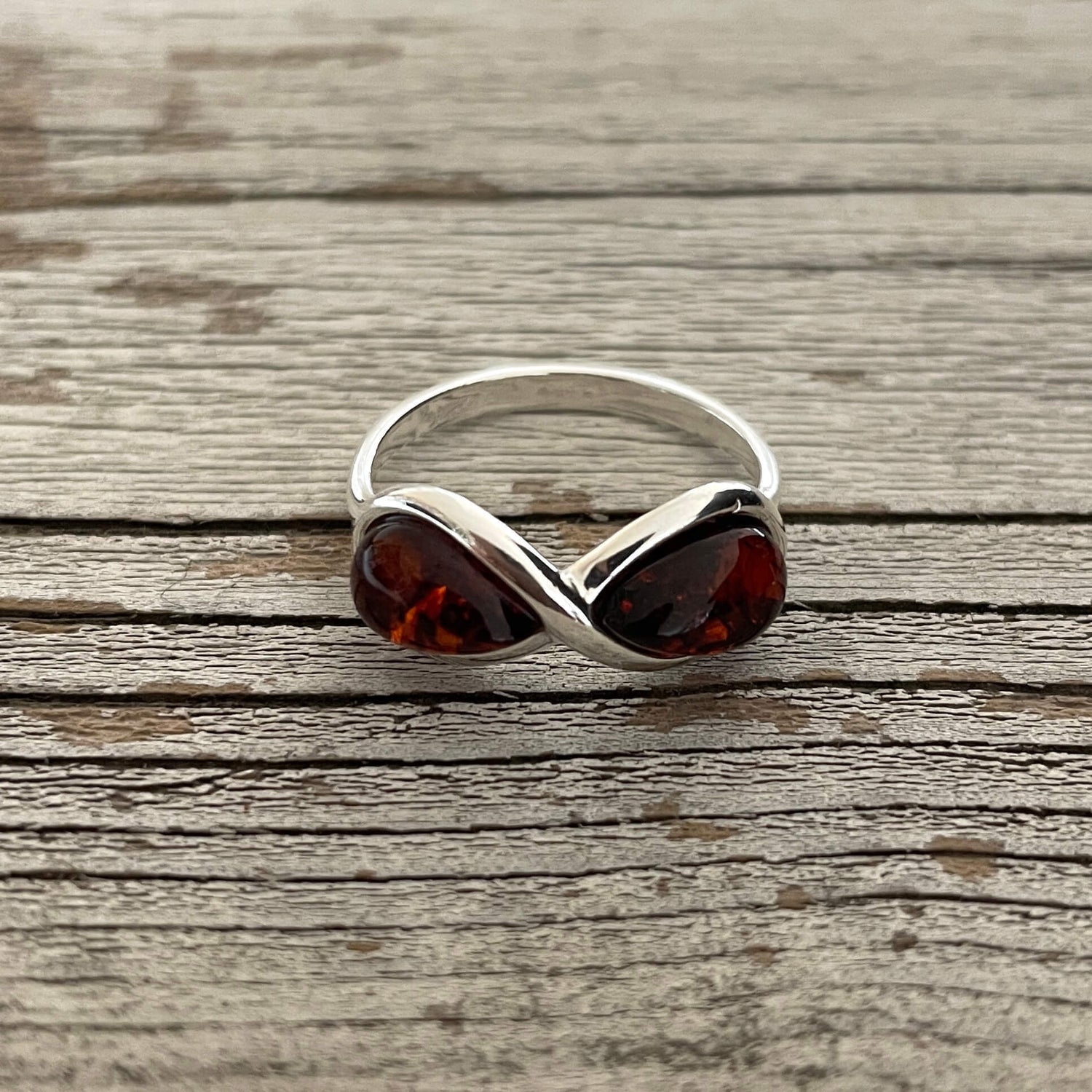 infinity shaped cognac amber ring
