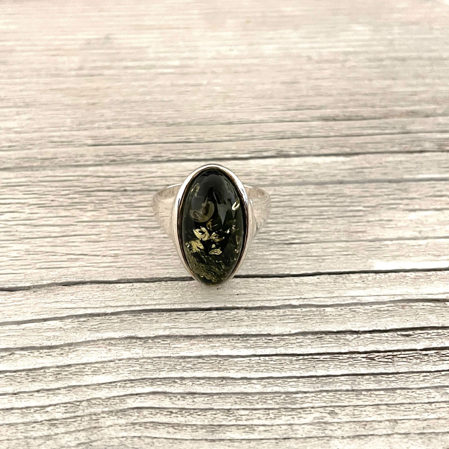 polished green amber ring