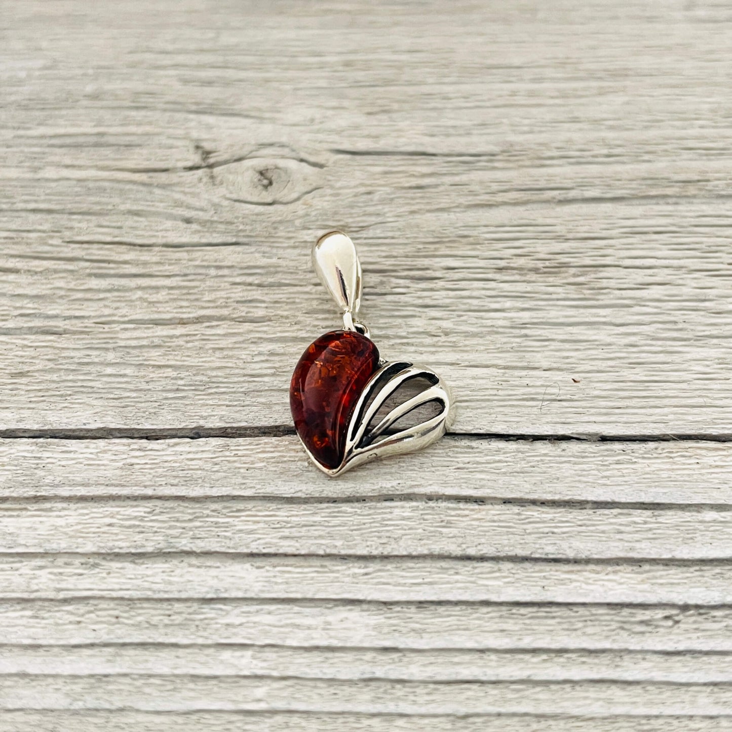 cogmac amber stone set in sterling silver love heart shaped pendant