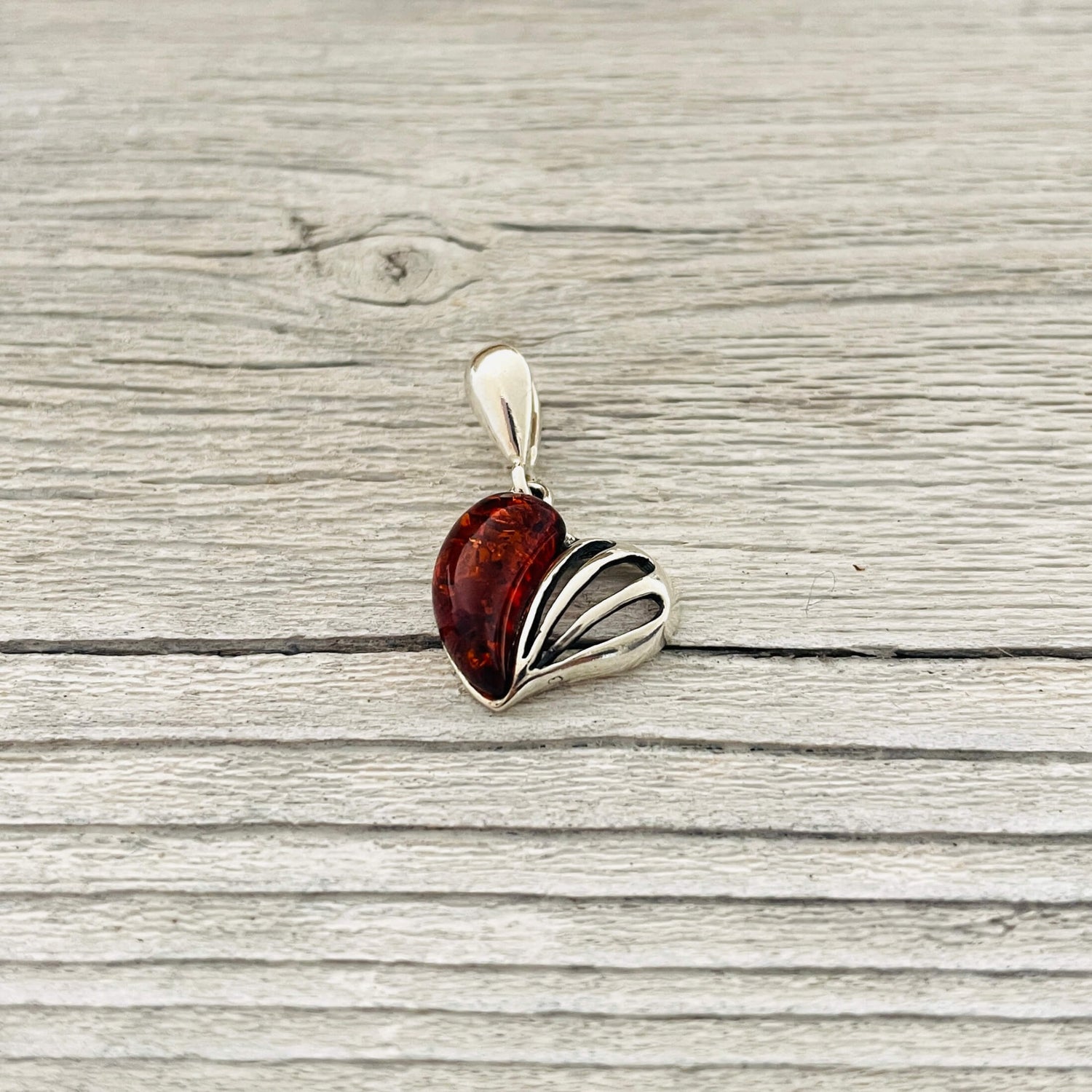 cogmac amber stone set in sterling silver love heart shaped pendant