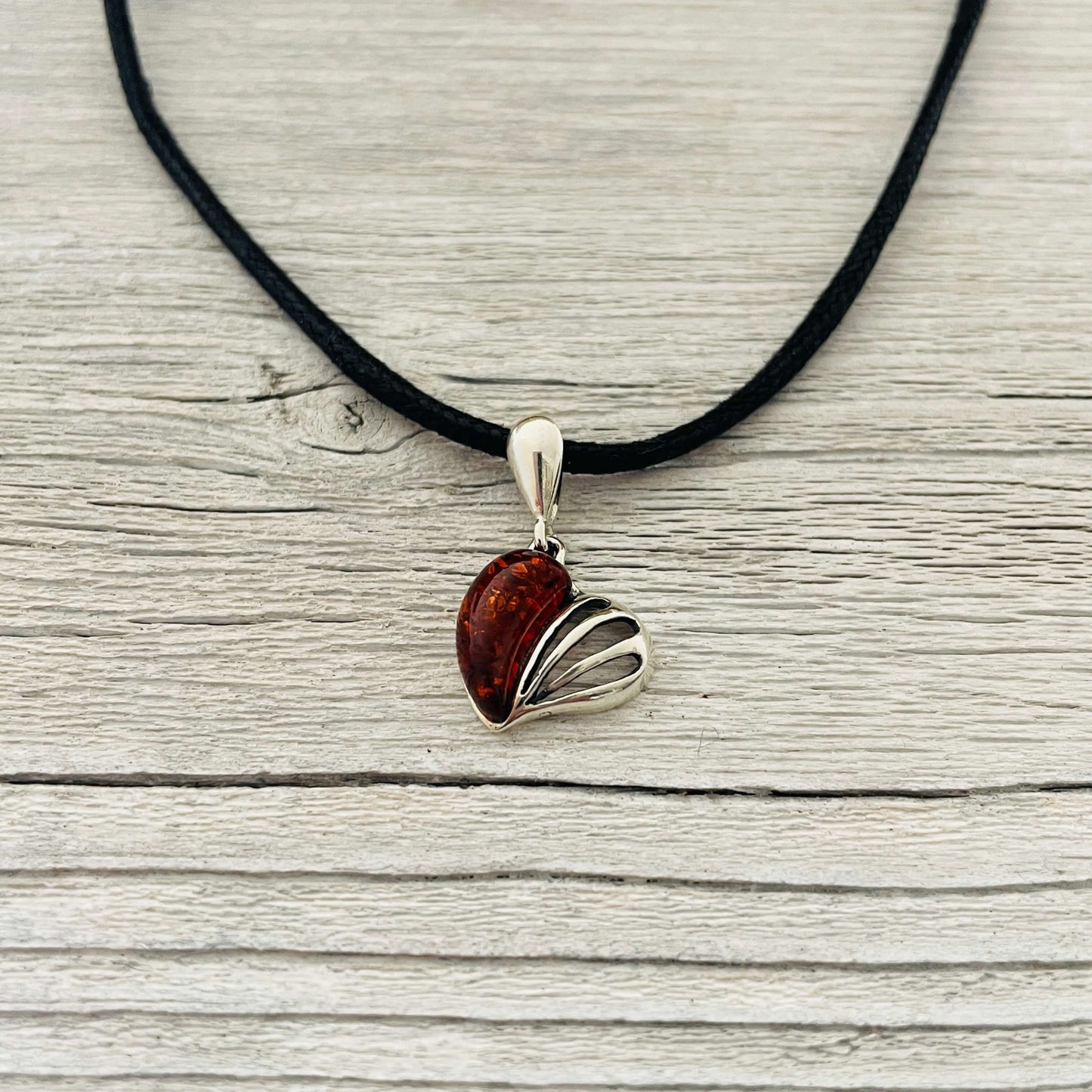 love heart shaped sterling silver and amber pendant