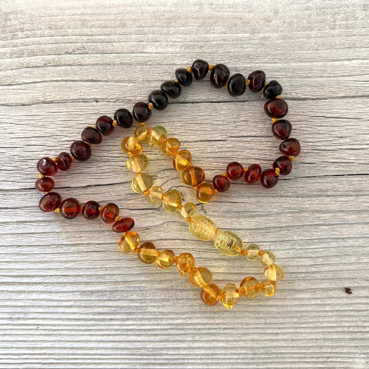Polished multicolour amber teething necklace with screw clasp
