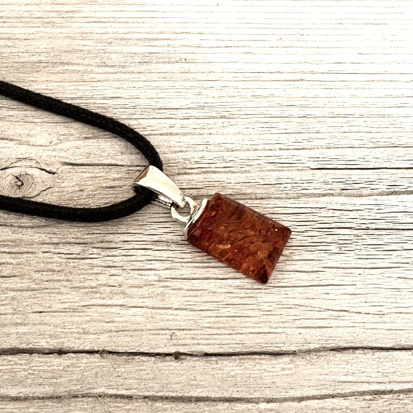 cognac coloured rectangular shaped pendant