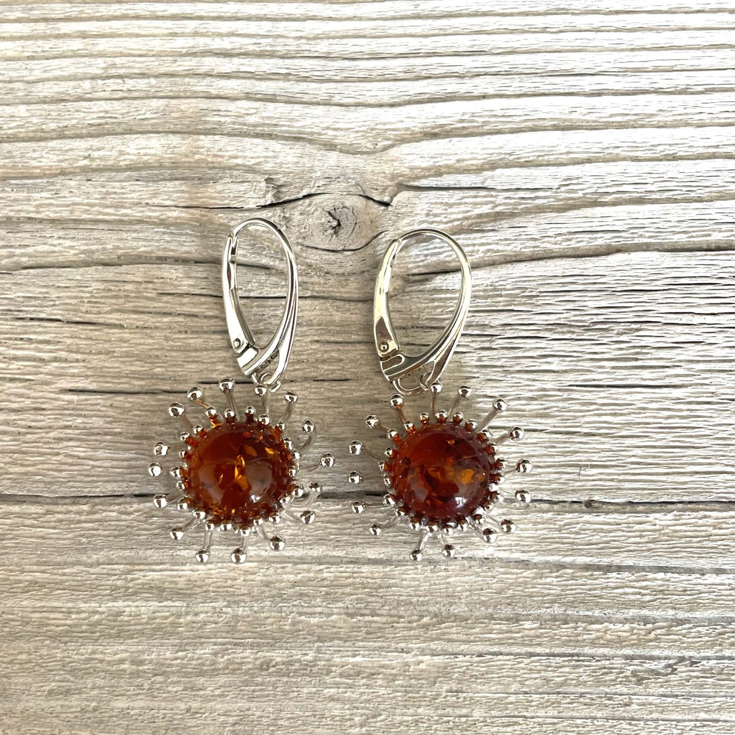 Sterling silver ans round shaped cognac amebr earrings