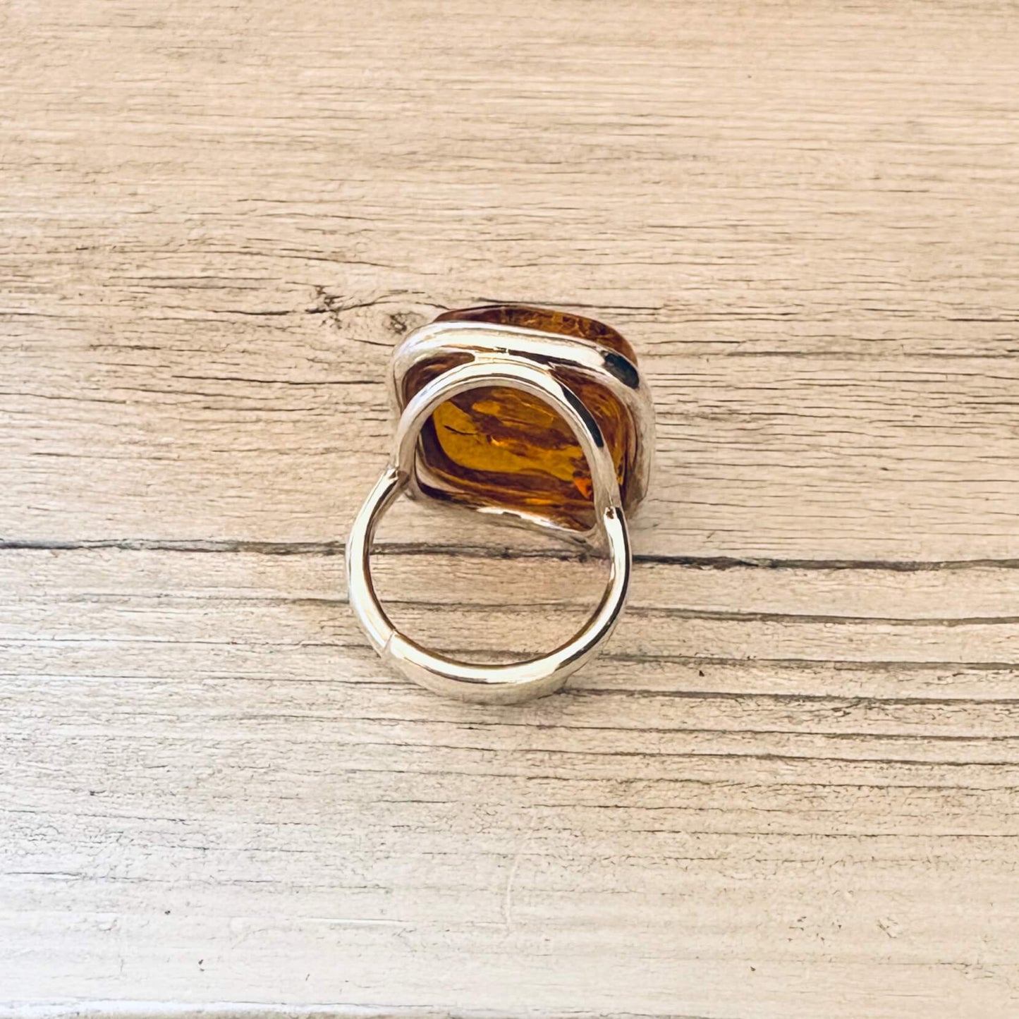 adjustable cognac amber ring set in sterling silver back