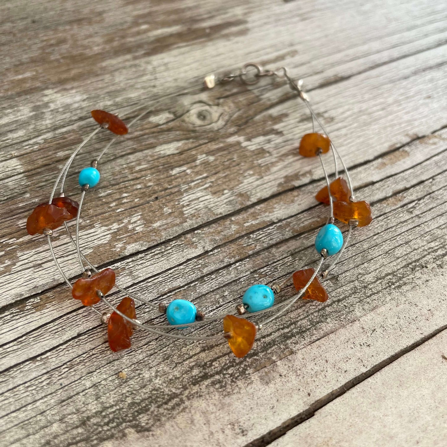 Three strand amber and turquoise bracelet