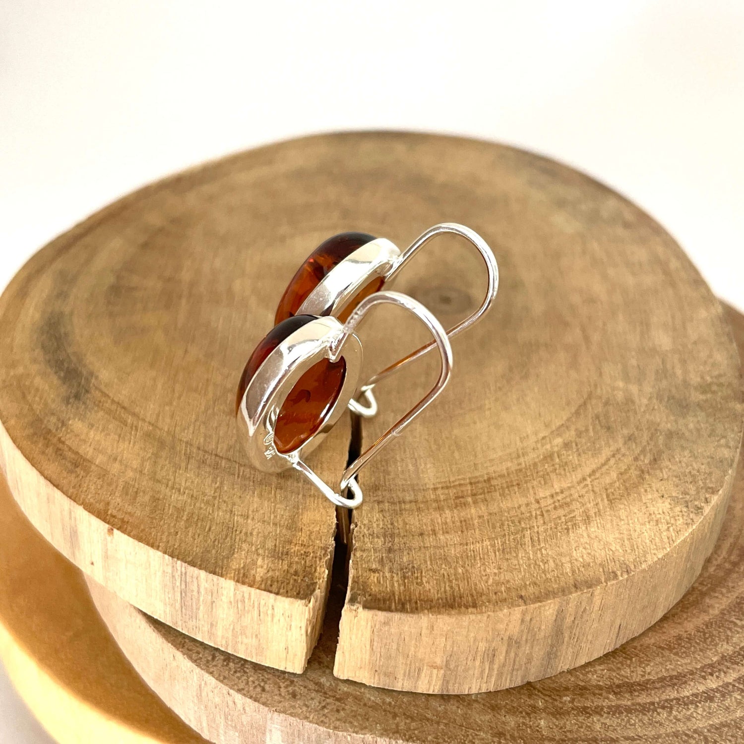cognac amber oval shaped hook earrings back side