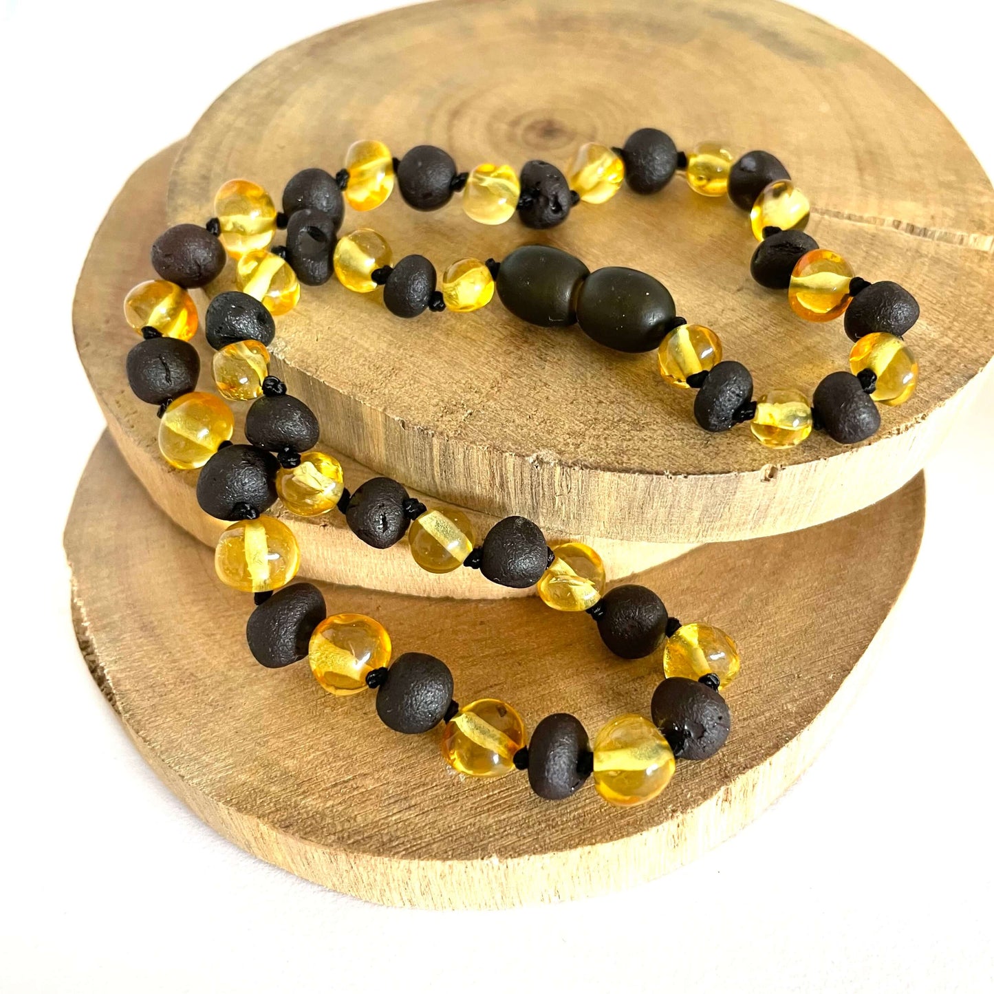 yellow and dark amber beaded baby necklace