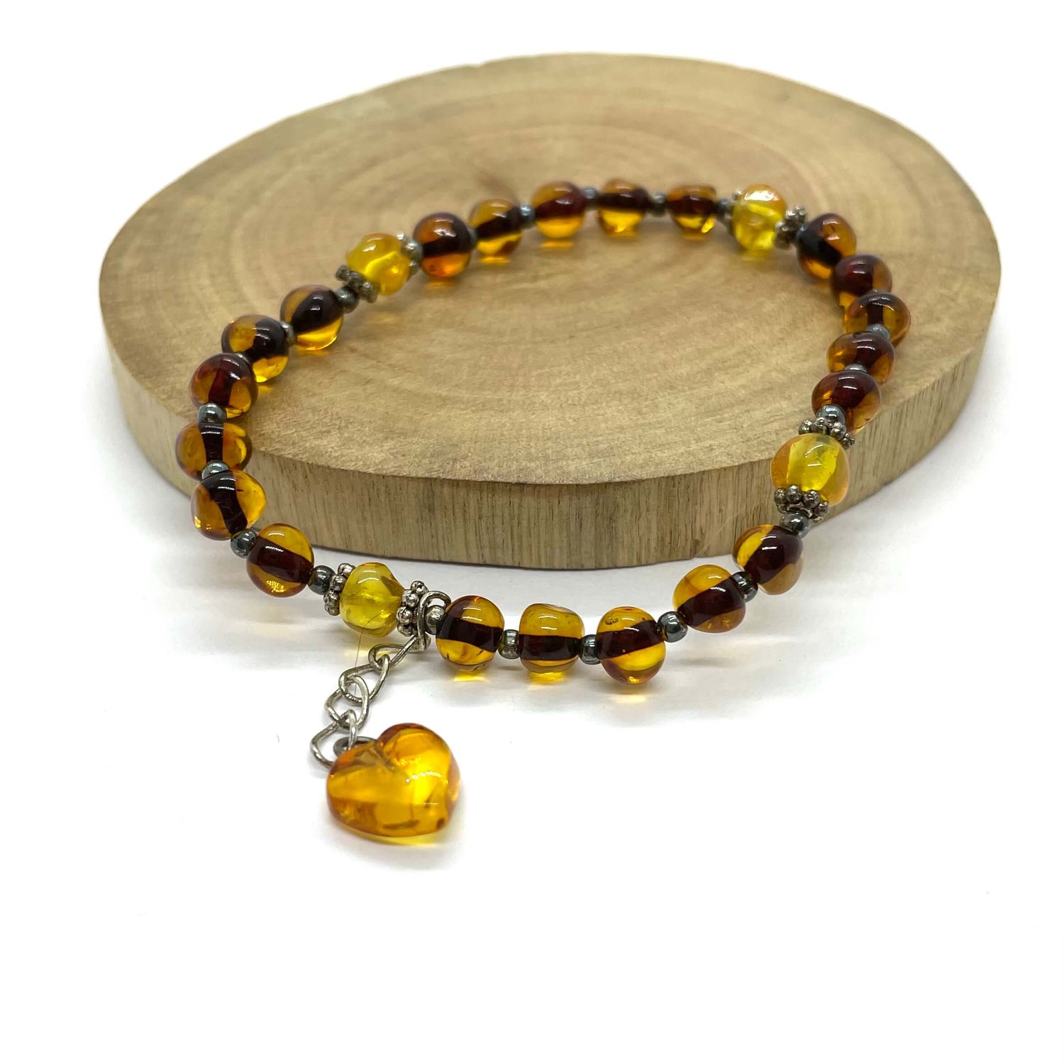 Baltic amber greenish beaded bracelet with a love heart