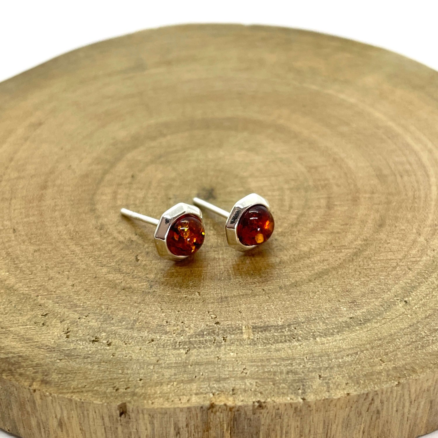 octogon shaped earrings with round amber set in sterling silver