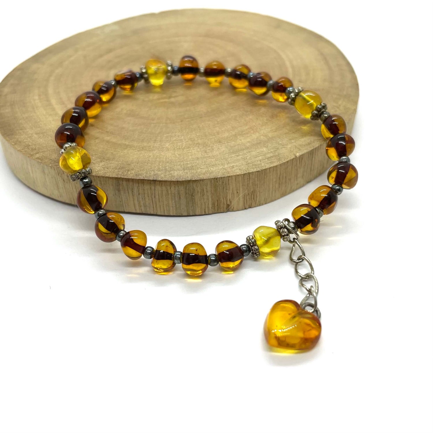 Baltic amber greenish beaded bracelet with a love heart