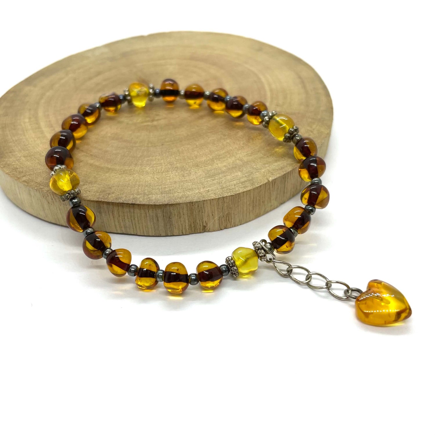 Baltic amber greenish beaded bracelet with a love heart