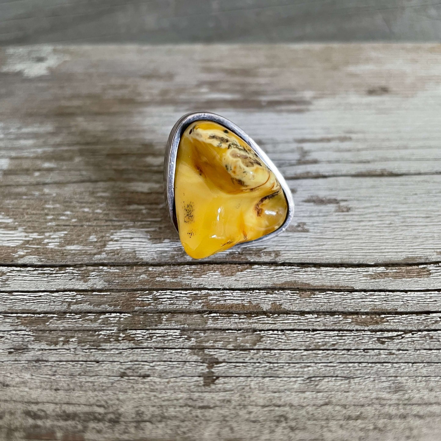 butterscotch triangle shaped amber and silver adjustable ring
