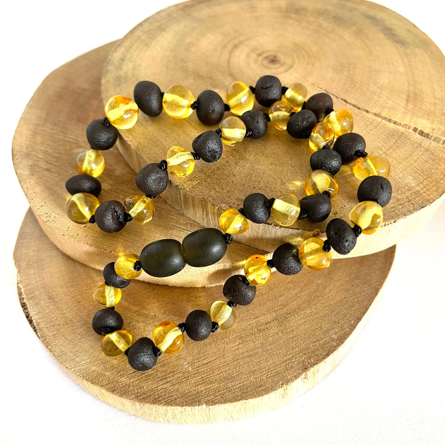 yellow and dark amber beaded baby necklace