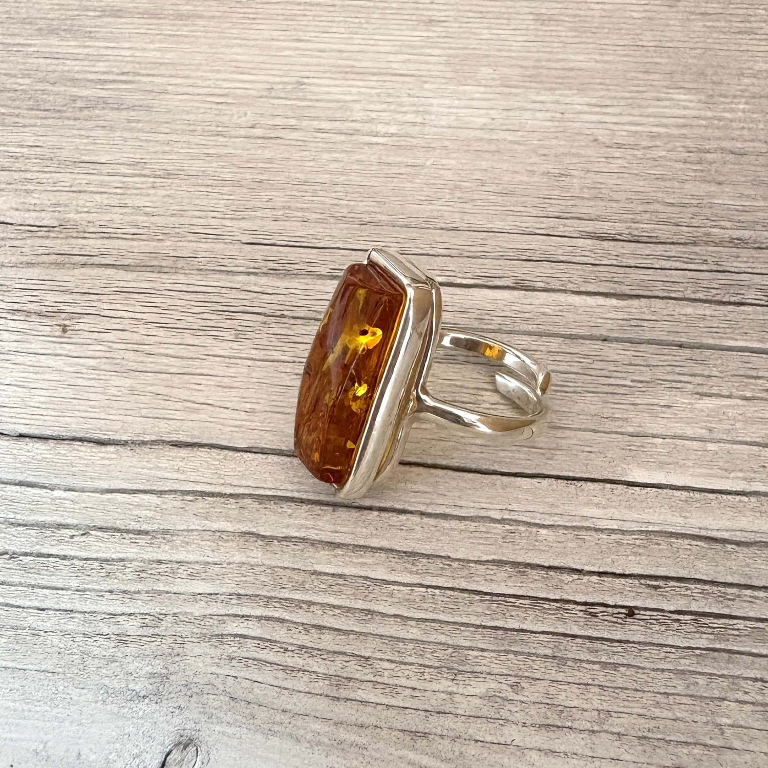 sterling silver and rectangular amber ring adjustable in size