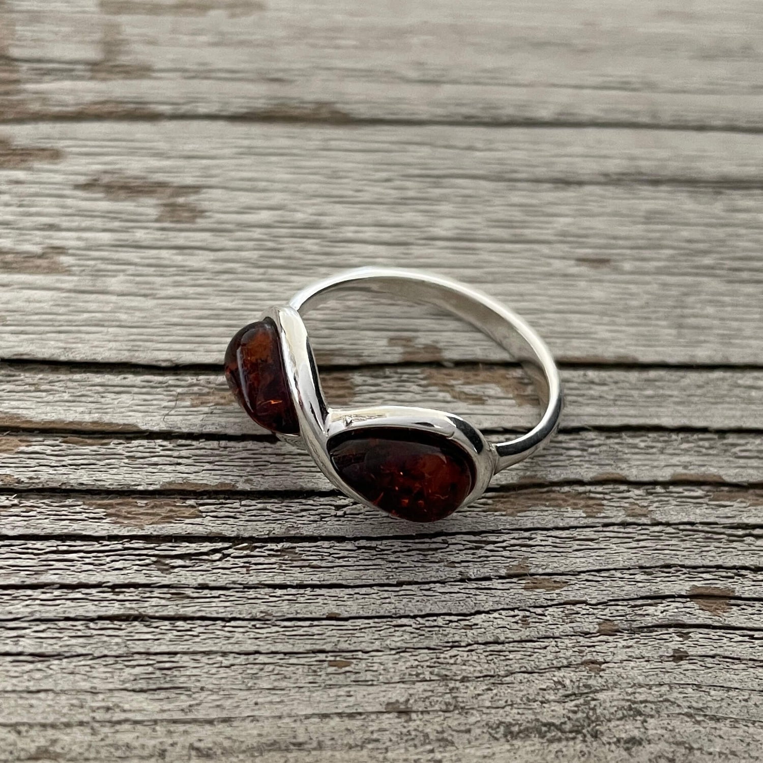 infinity shaped cognac amber ring