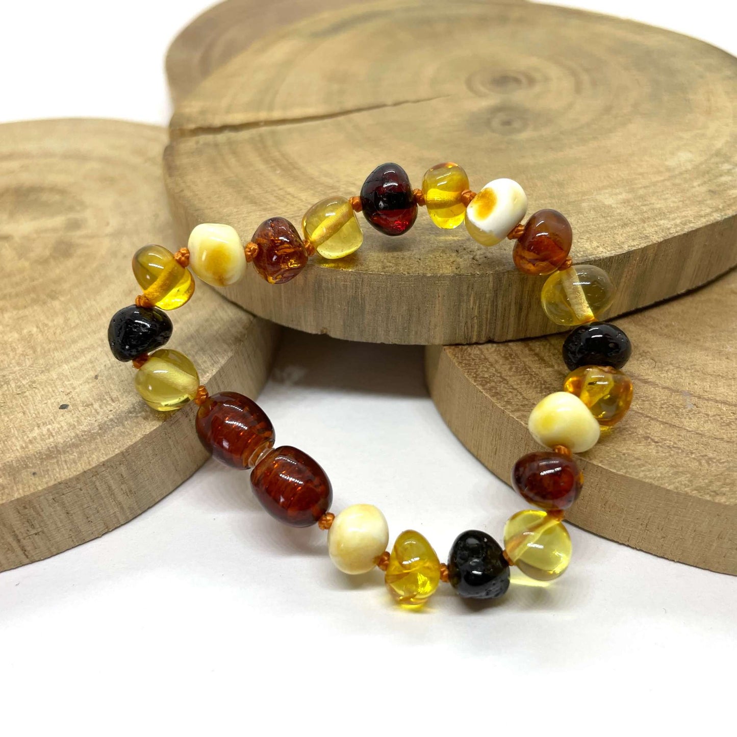 cherry cognac honey and butterscotch beaded baby baltic amber bracelet with screw clasp