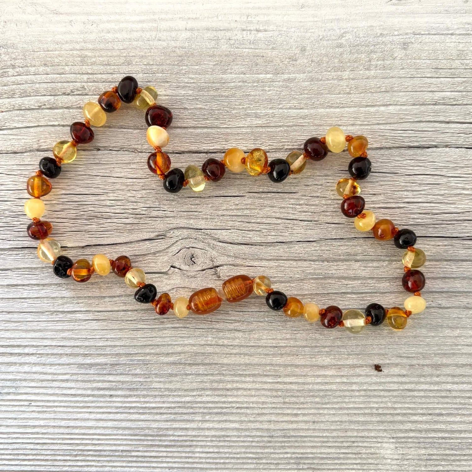 Multicolored beaded teething amber necklace