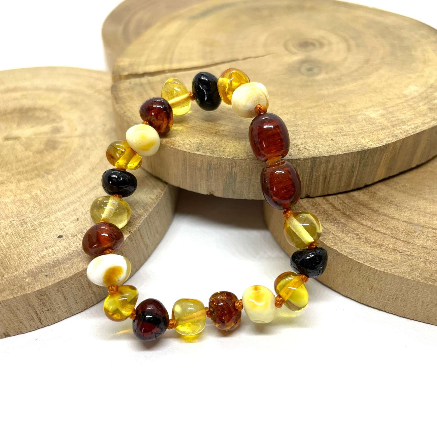 mixed coloured beaded baby baltic amber bracelet with screw clasp