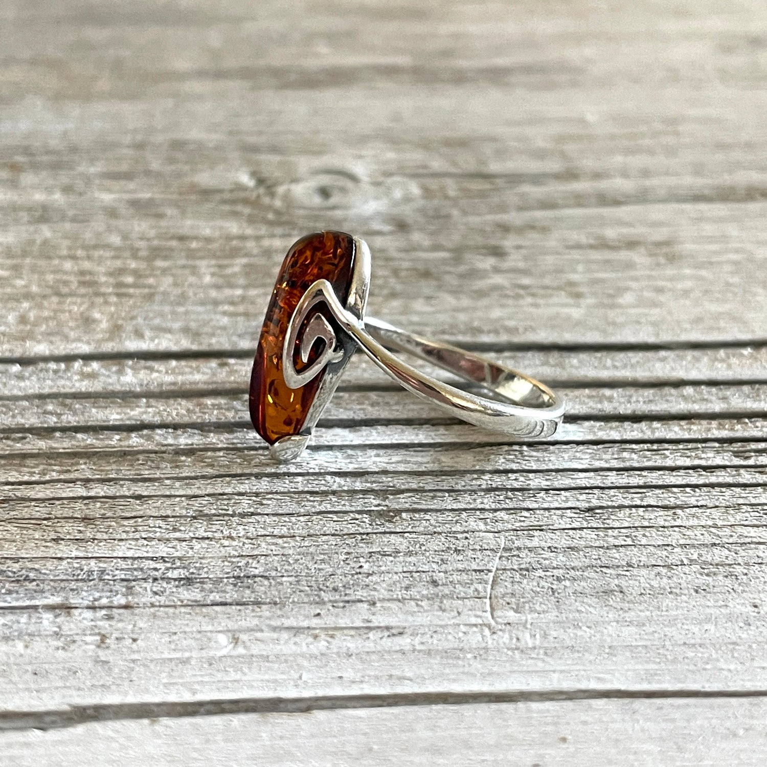 teardrop shaped cognac amber ring set in sterling silver