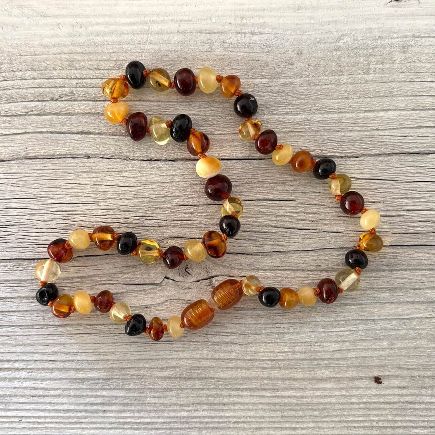 Beaded amber teething necklace with clasp