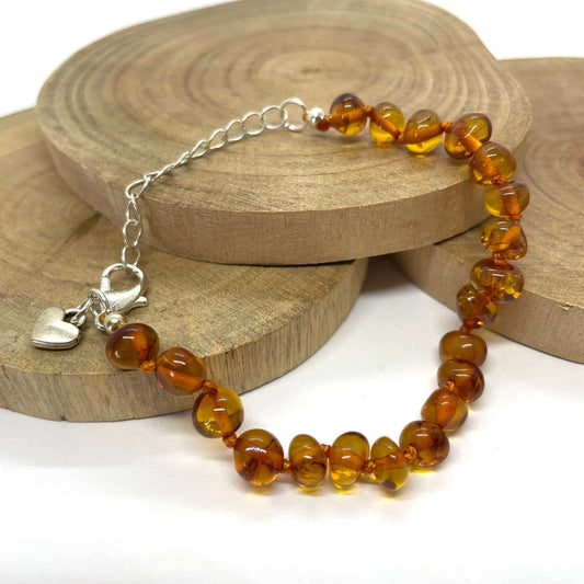 cognac amber bracelet with silver heart and lobster claw
