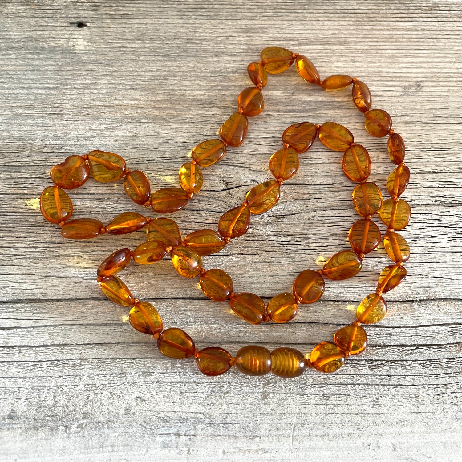 beaded cognac coloured amber necklace with screw clasp