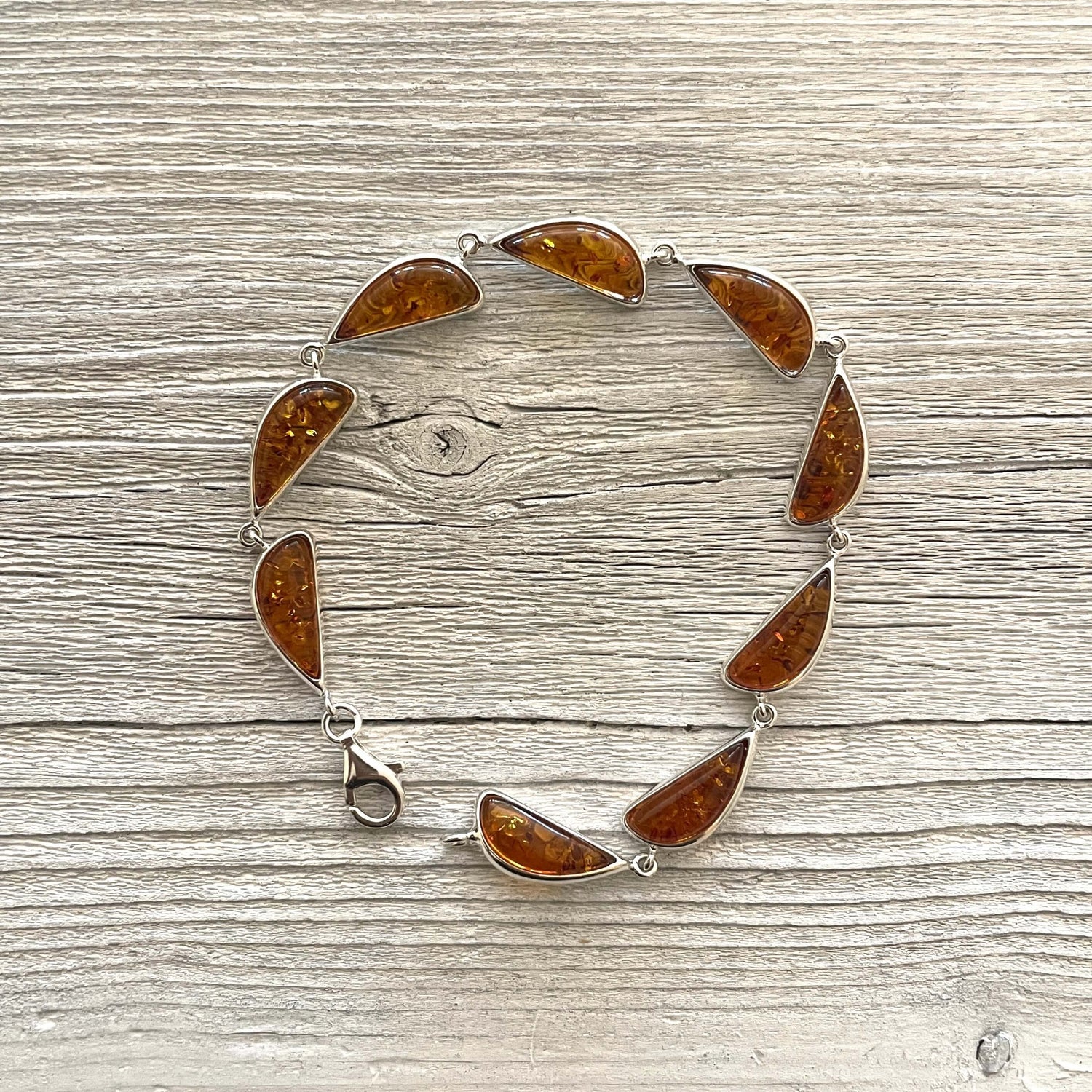 cognac amber bracelet set in sterling silver with a lobster claw