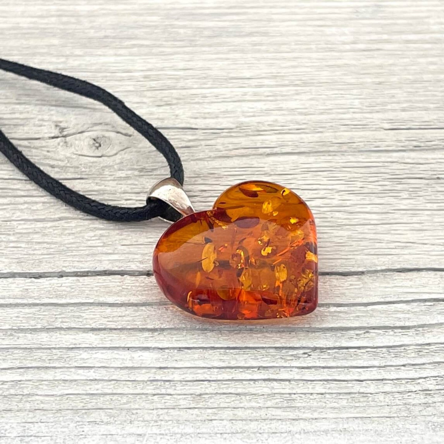 polished amber lover heart shaped pendant