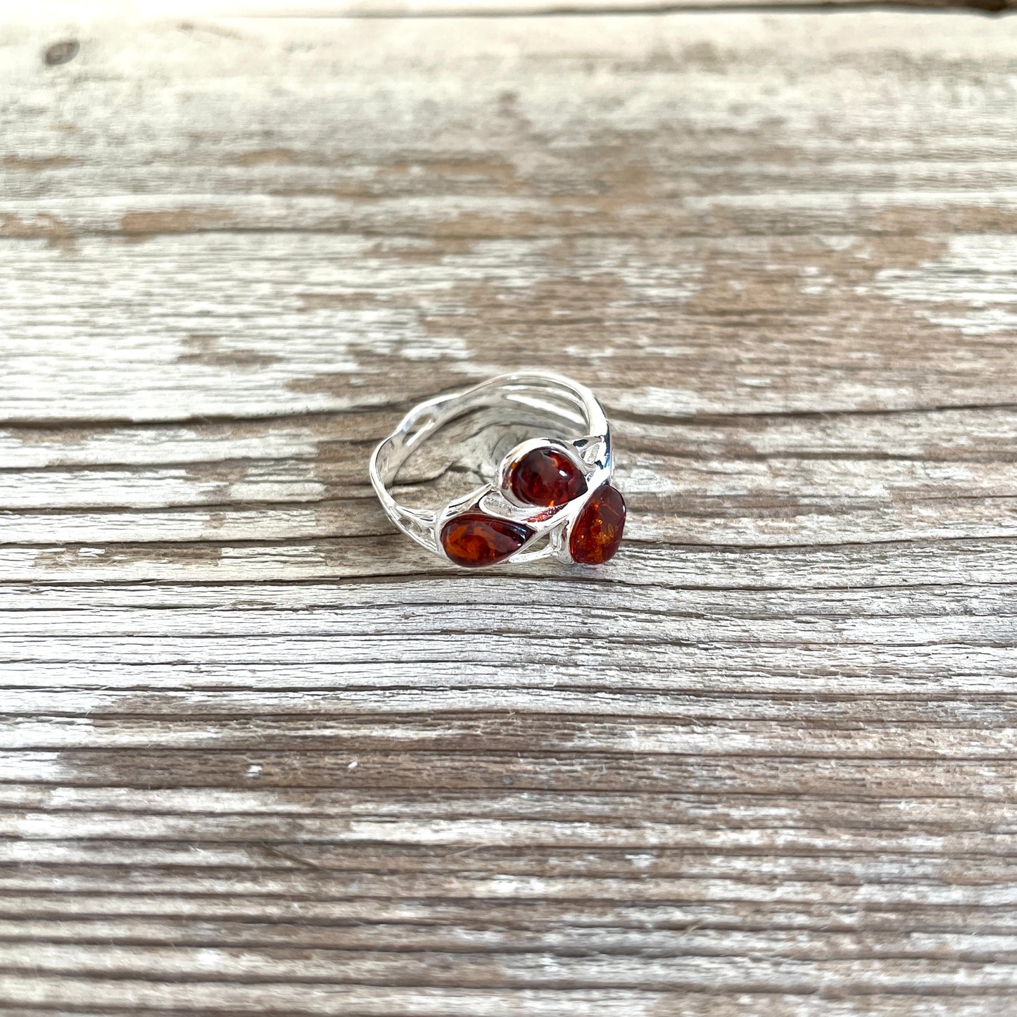 three stone cognac amber ring set in sterling silver
