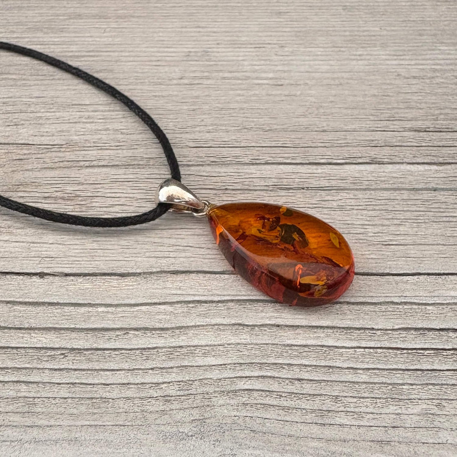 amber pendant on a sterling silver link