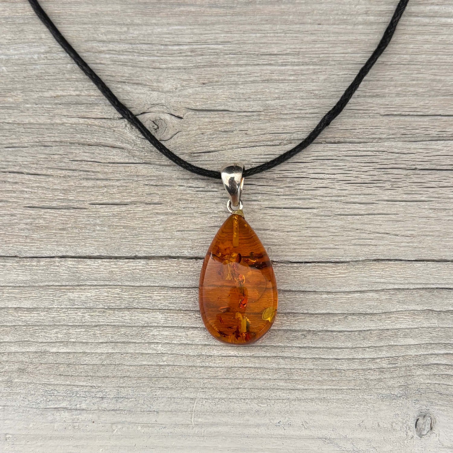 amber pendant in a tear drop shape