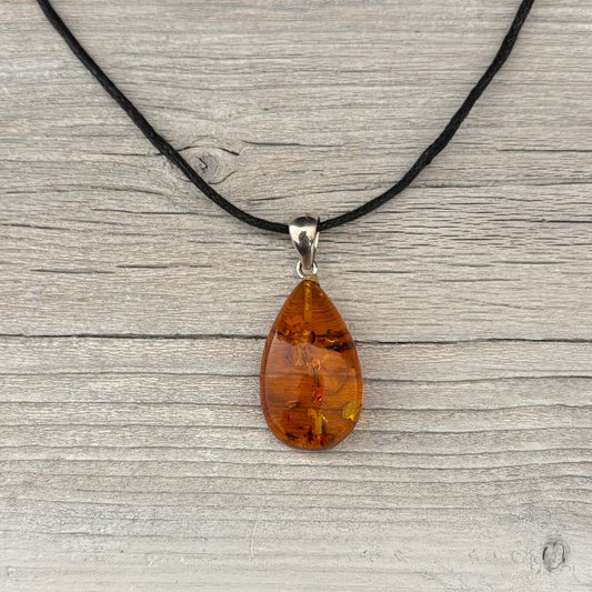amber pendant in a tear drop shape