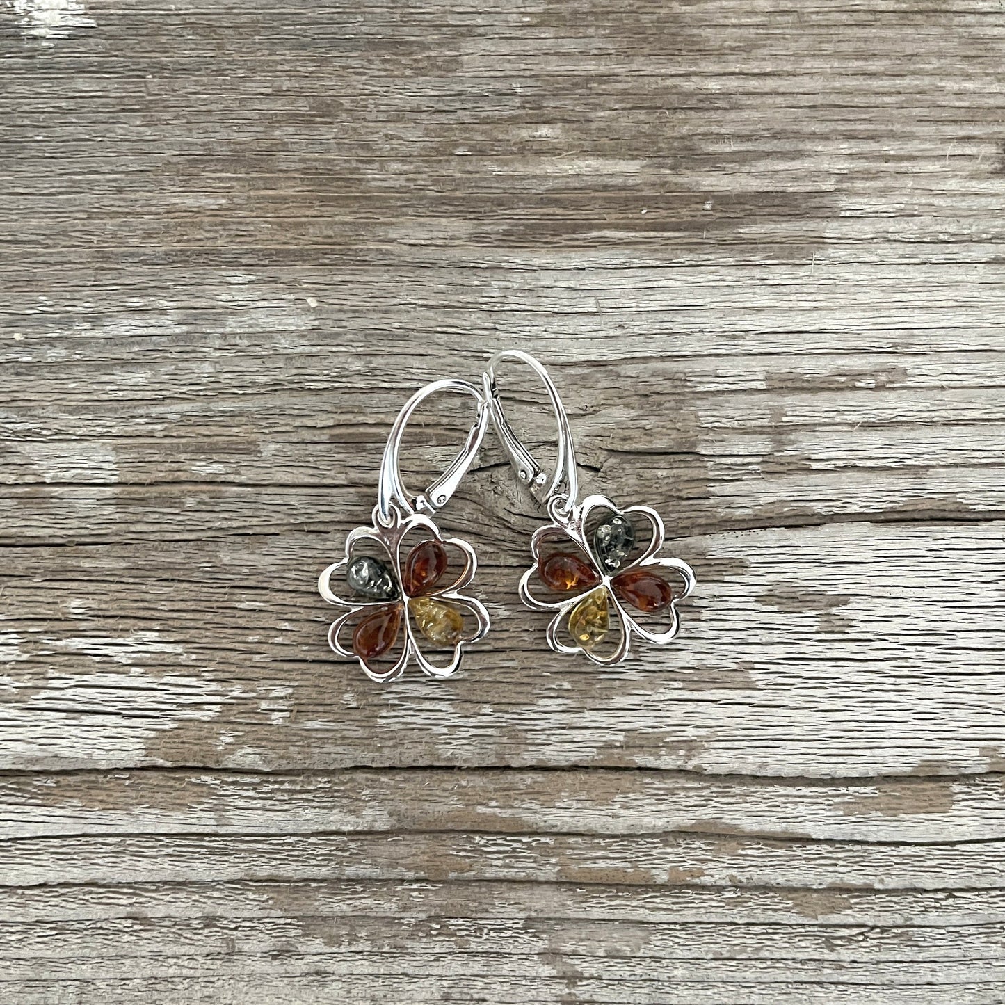 Lever back flower shaped amber sterling silver earrings
