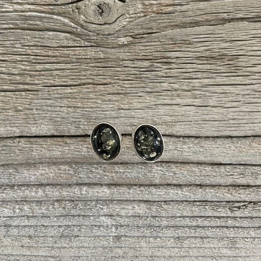 oval shaped green amber earrings set in sterling silver