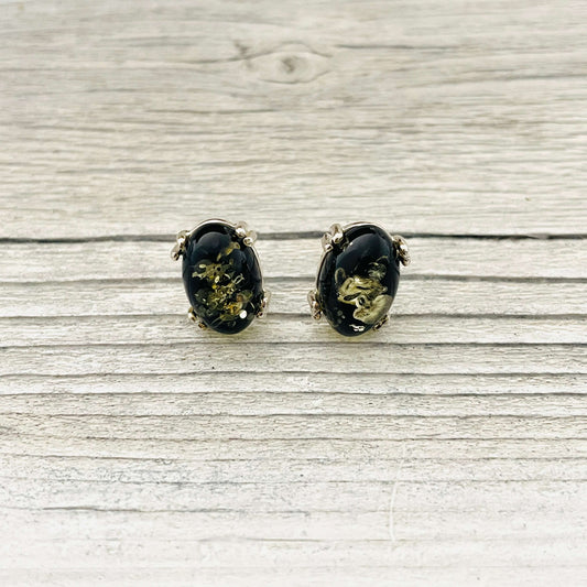 green amber stud earrings front