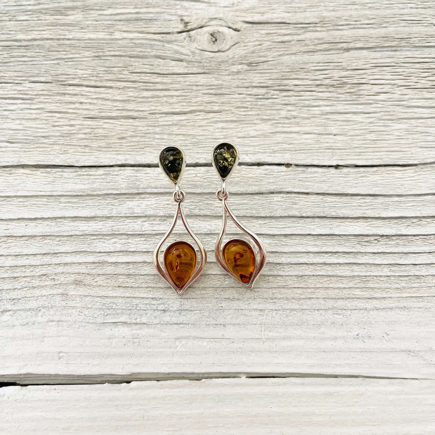 sterling silver and dangle style amber earrings