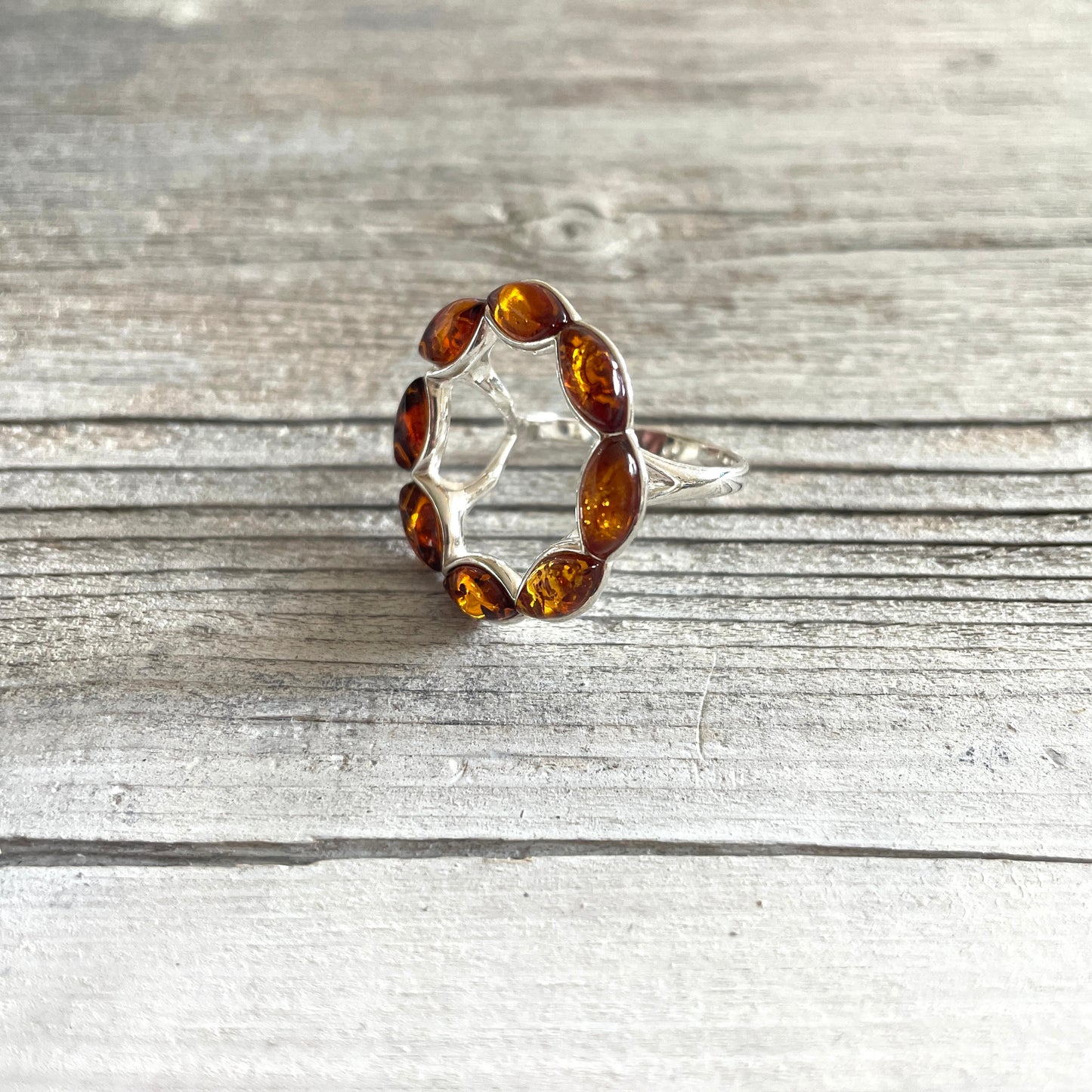 round cognac amber ring set in sterling silver right side