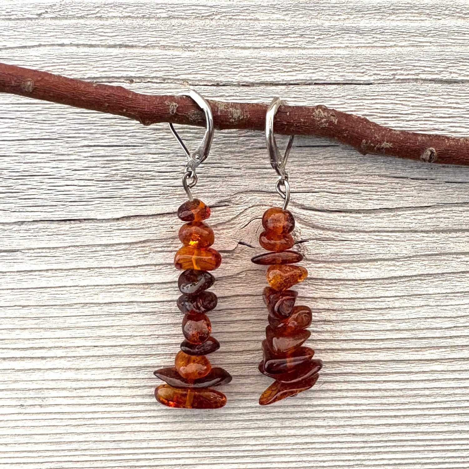 Pair of long beaded amber earrings with lever back