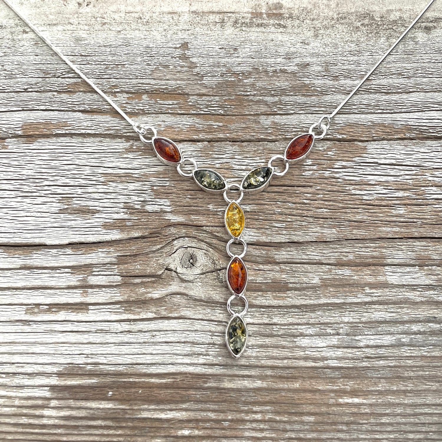 cognac yellow and green amber necklace set in sterling silver