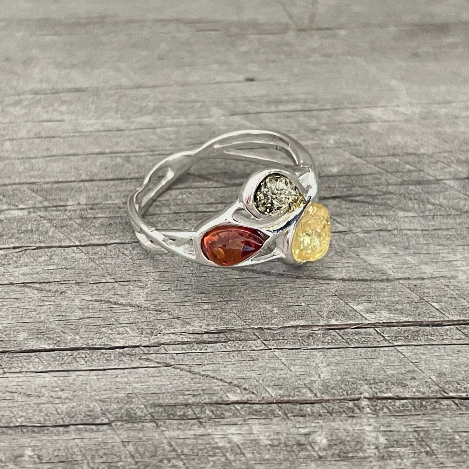 sterling silver amber ring with mixed coloured amber stones