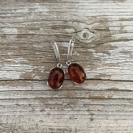 amber oval shaped cognac coloured drop earrings set in sterling silver