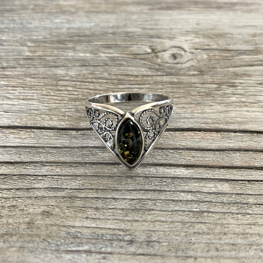 oval shaped green amber ring set in sterling silver front side